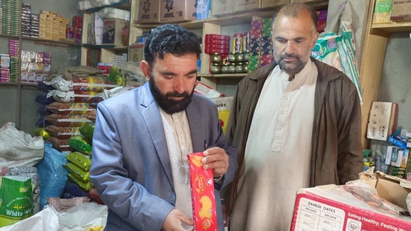 Tehsildar Shontar Asan ul Haq is checking the real prices of different goods