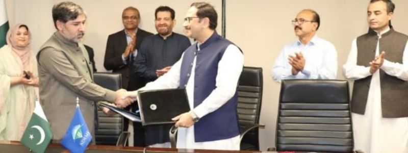 CEO NDRMF, Secretary Health Services G-B Sanaullah and Chief Economist Planning and Development shake hands after signing agreement in Islamabad